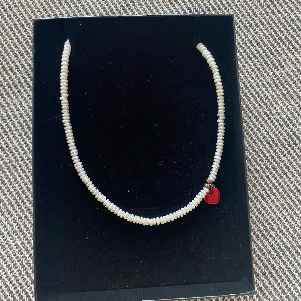 Pearl choker necklace with asymmetrical red heart